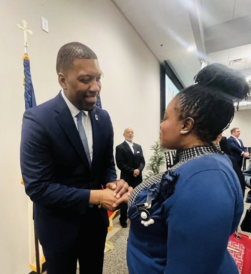 Erica Mitchell attending a community event with Democratic leaders, photo 2