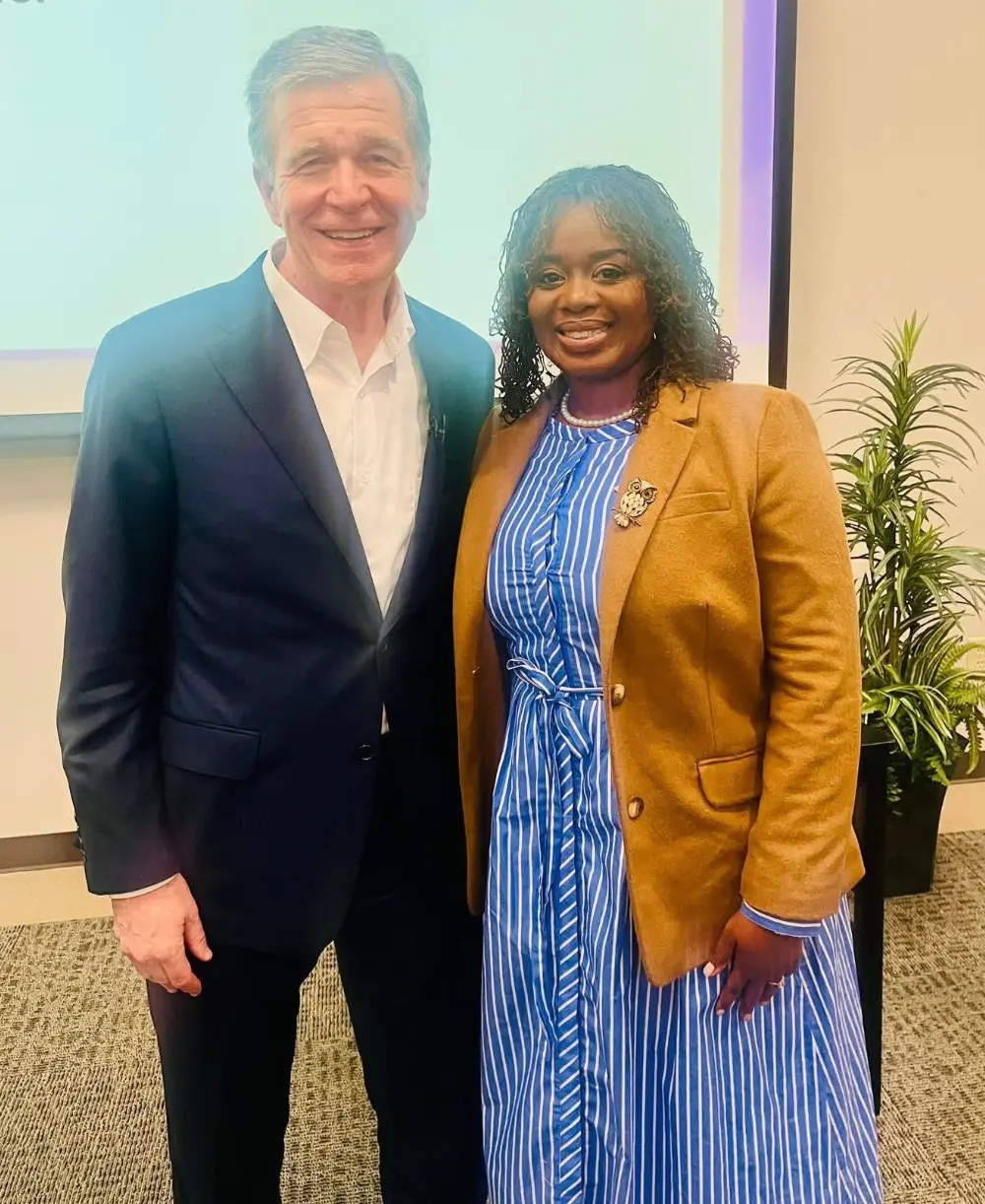 Erica Mitchell attending a community event with Democratic leaders, photo 7