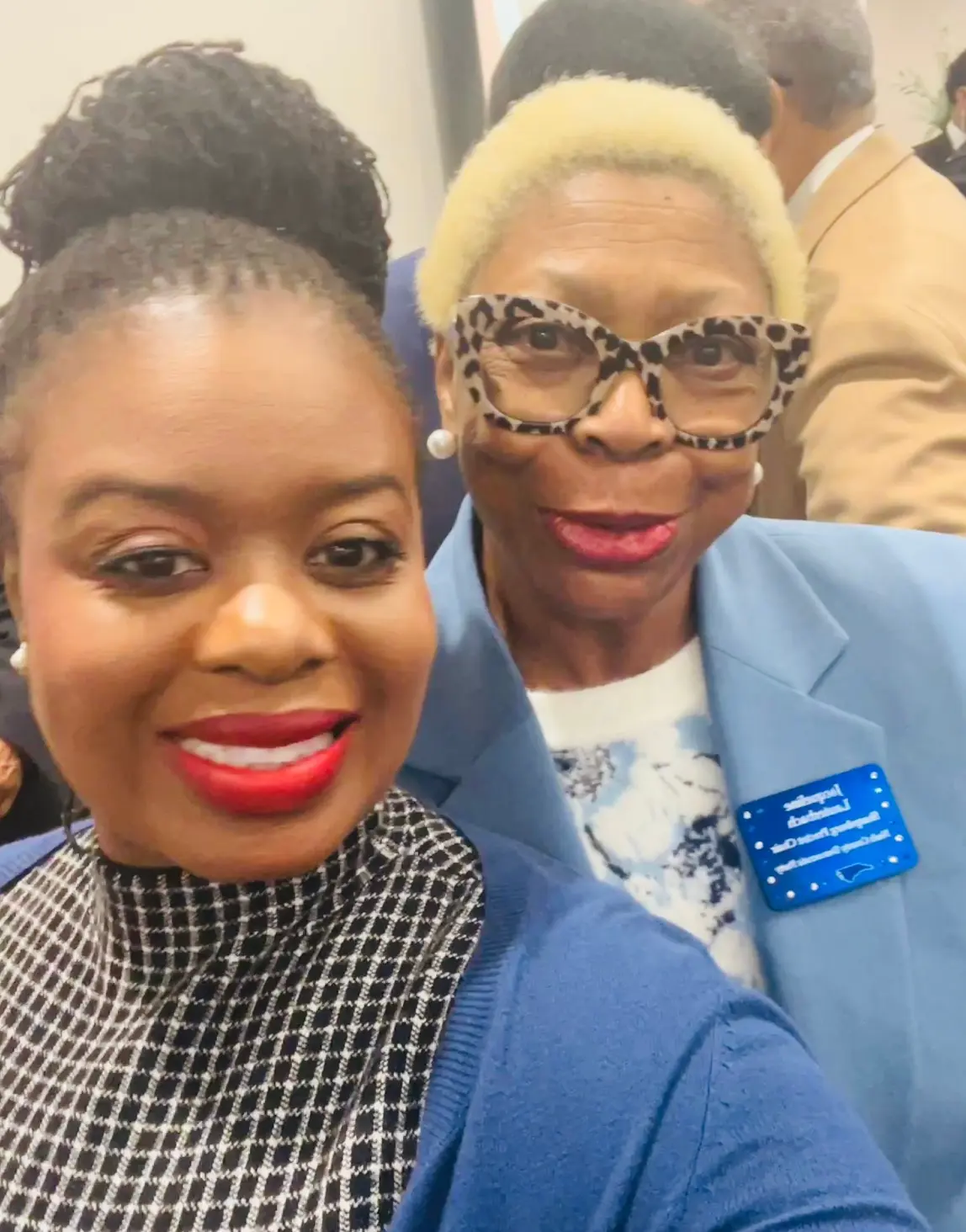 Erica Mitchell attending a community event with Democratic leaders, photo 3