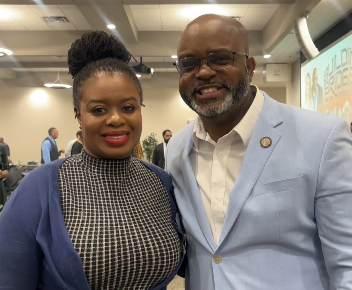 Erica Mitchell attending a community event with Democratic leaders, photo 4